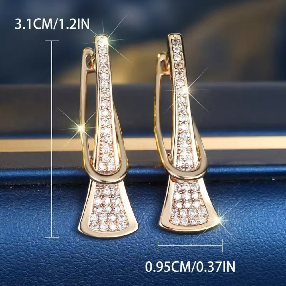Sleek U-line earrings with a delicate hollowed bar detail. - Picture 2 of 5